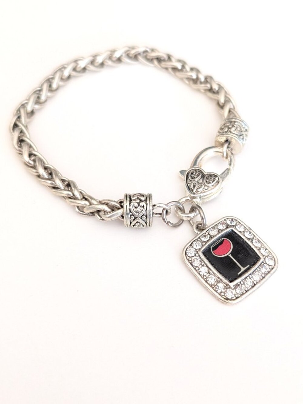 Twisted silver chain bracelet with red wine drink charm w/cz accents